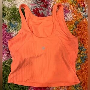 Peach/orange high neck ribbed align tank from Lulu!